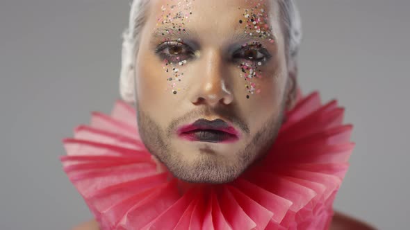 Sequence of Man in Clown Couture Look Posing