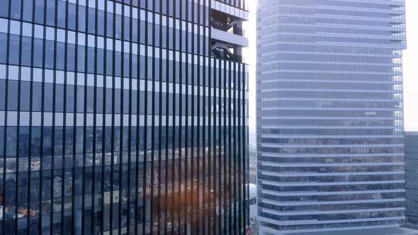 Modern office buildings. Aerial view in front of office building with reflecting windows.