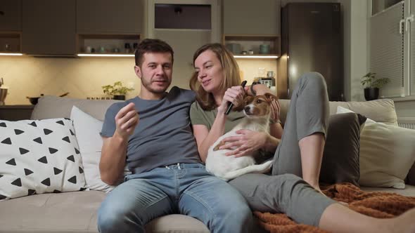 Couple Watching Tv in Living Room