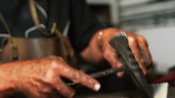 Welder working on a piece of metal