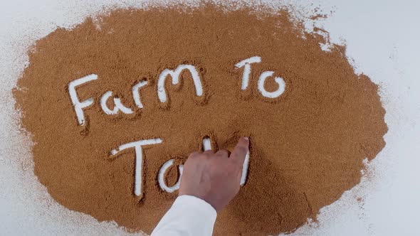 Hand Writes On Soil  Farm To Table