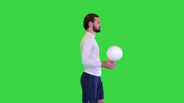Soccer Player with a Bag in Hands Walking on a Green Screen Chroma Key