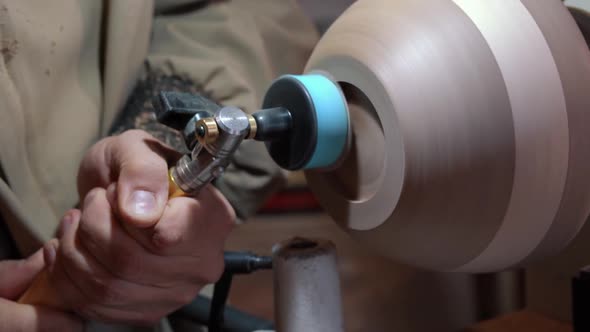 Carpenter Works with Tree with Sander Machine. Electrical Technology, Creates Comfortable Repair