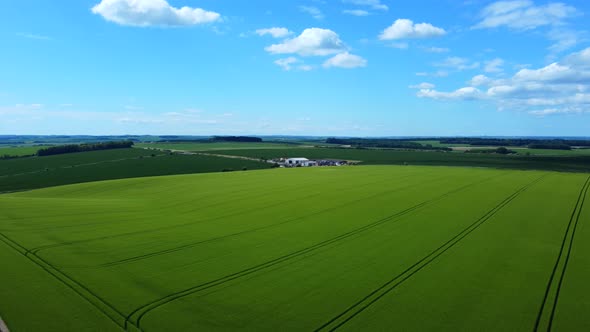 Beautiful aerial birds eye view over farmland and fields in Salisbury Plains, England