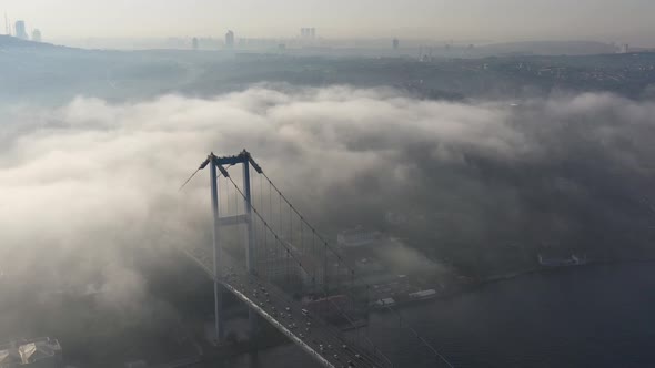 aerial video of bosphorus Bridge on a foggy day in Istanbul, Turkey. July 15 Martyrs Bridge 03