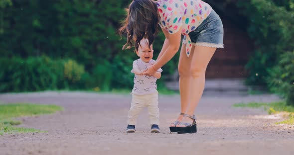 Baby is Walking Along the Path and Crying