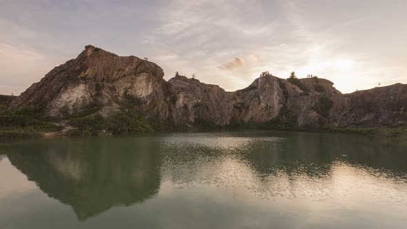 Sunset perfect reflection of rock stone 