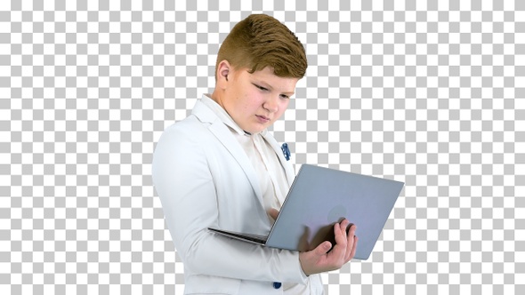 Young businessman working on laptop, Alpha Channel