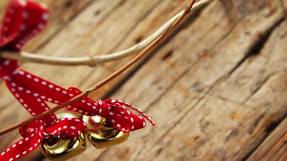 Jingle bells hanging on a branch