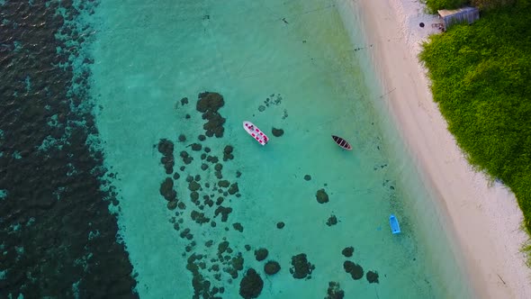 Aerial view texture of shore beach voyage by blue lagoon and sand background