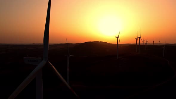 Windmills Turbines at Sunset