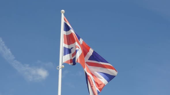 Slow motion England and United Kingdom flag  flowing against blue sky  1920X1080 HD footage - Slow-m