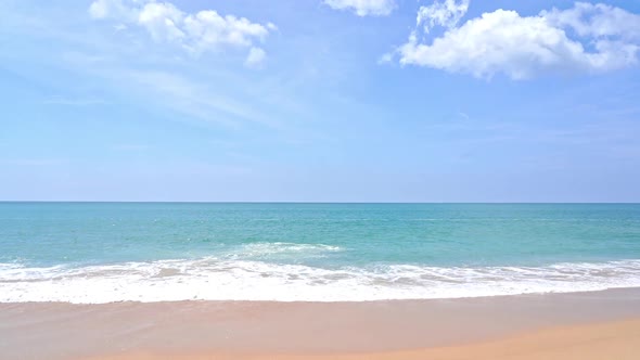 Beautiful tropical beach sea ocean with blue sky and white cloud