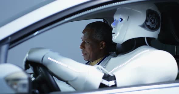 Scientists Testing a Car Driving Robot