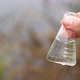 Water sample. Hand collects water to explore. - VideoHive Item for Sale