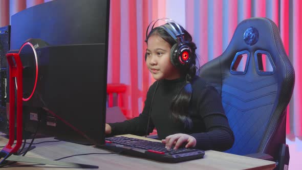 Kids Girl Made Confidence During Playing A Computer Game, Feeling Challenge