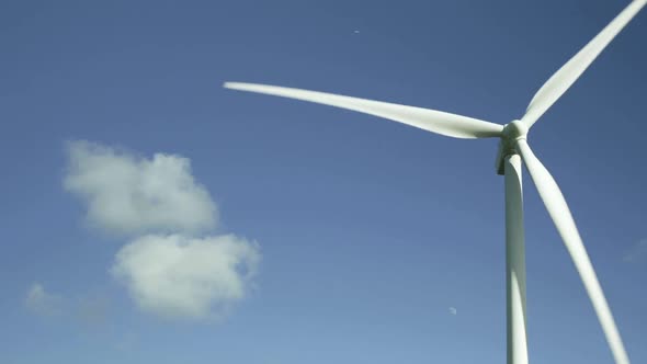 Wind turbine against sky