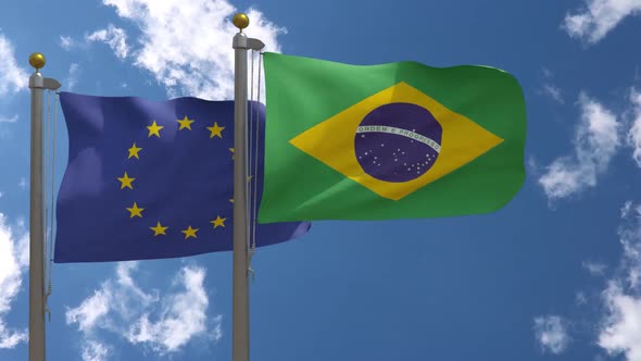 European Union Flag Vs Brazil Flag On Flagpole