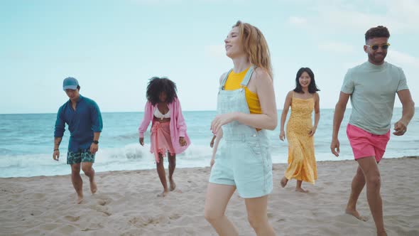 Group of friends having fun on the beach.