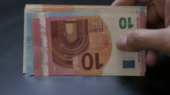 Spreading by hand  lot of   European Union currency lot 4K 3840X2160 UltraHD video - Wad of Euro mon