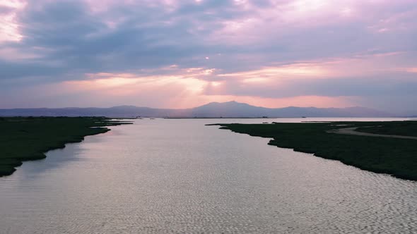 Sunrise over the wetland of delta of Axios river, Greece.