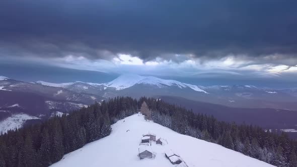 Flying Over Houses and Winter Forest