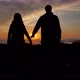Slow Motion Full Size Couple Joining Hands Together with Sunlight in Background - VideoHive Item for Sale