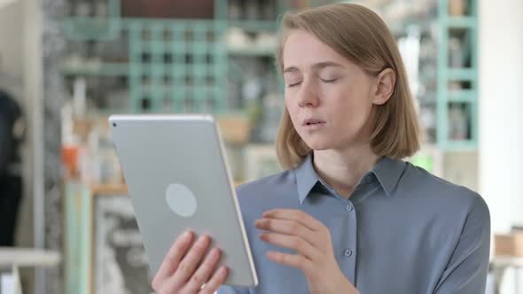 Portrait of Young Woman Feeling Angry on Tablet