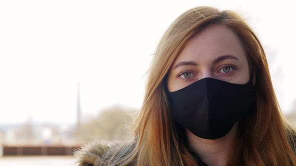 Woman Wearing Protective Reusable Barrier Mask