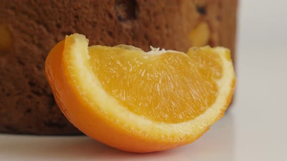 Panettone  cake sliced orange 4K slow tilt footage