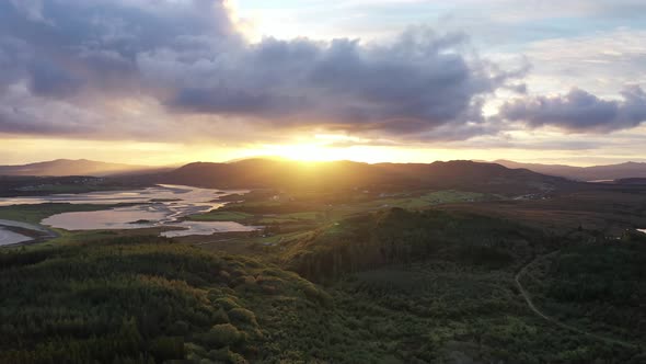 Flying Into the Sunrise Over Ballyiriston in County Donegal - Ireland.