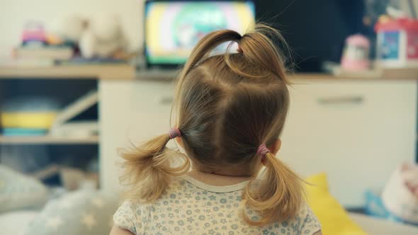 Little Girl Watching Cartoon. Kids Leisure And Entertainment. Infant Baby Watching Television.