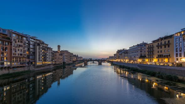 Twilight Sky Scene of Ponte Santa Trinita Holy Trinity Bridge Day To Night Timelapse Over River Arno