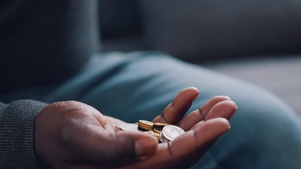 Close Up Hands with Coins