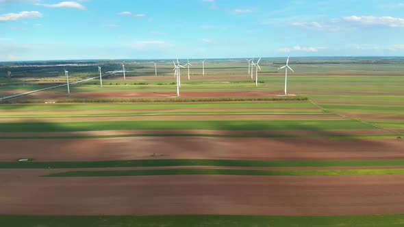 Aerial View of Wind Turbines Farm in Field. Austria. Drone View on Energy Production