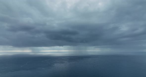 Cloudy sunset at sea aerial view 4 K