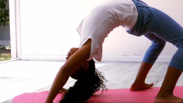 Teenage girl practicing yoga