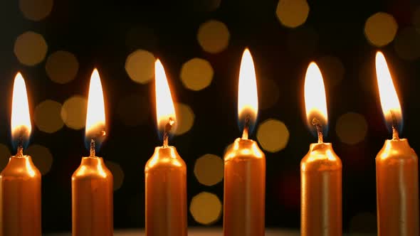 Candles burning at christmas time