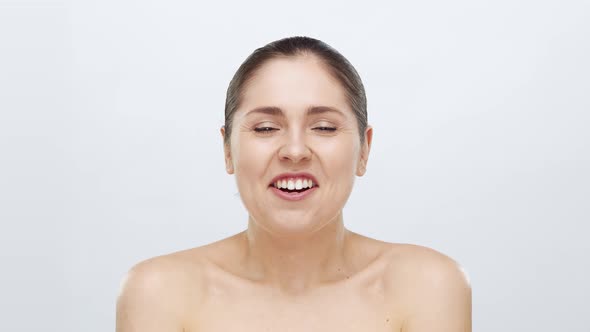 Studio portrait of young, beautiful and natural blond woman