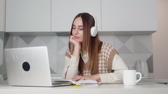 Girl College Student Using Laptop Computer Watching Distance Online Learning Seminar Class Remote