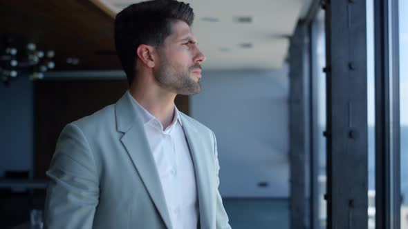 Nervous Businessman Watching Sea View Window