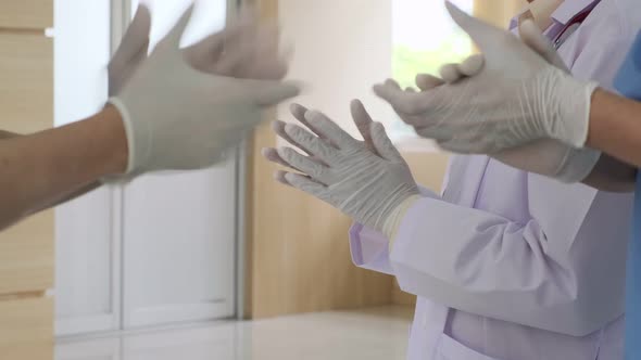 slow motion closeup hand applaud from doctor and nurse suppor