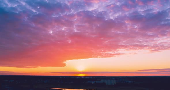 A Colorful Sunset Hyperlapse with the Sun Going Beyond the Horizon