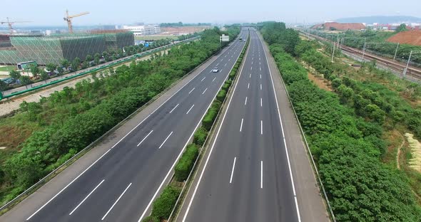 Aerial view of highway and overpass in city