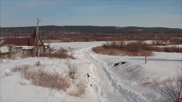 Winter landscape in the village shot from a quadcopter.