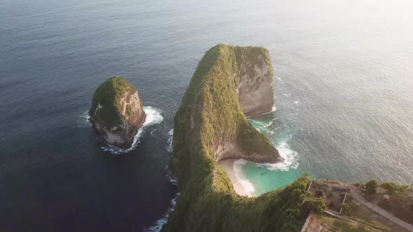 Aerial overhead view of Kelingking Beach in Nusa Penida, Bali, Indonesia.