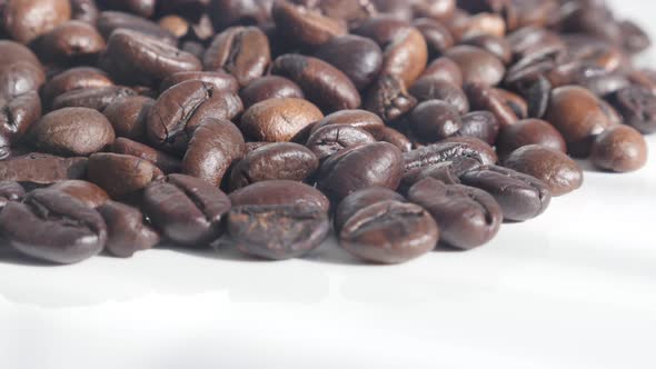 Lot of roasted coffee beans  4K tilting video