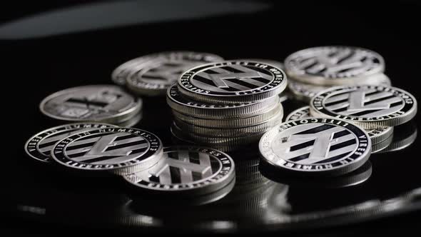 Rotating shot of Bitcoins (digital cryptocurrency) - BITCOIN LITECOIN 377