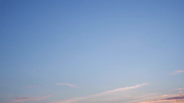 4K UHD : Time lapse of colorful sky during beautiful sunset. Romantic clouds.