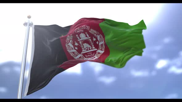 Afghanistan flag waving at wind in slow with blue sky 